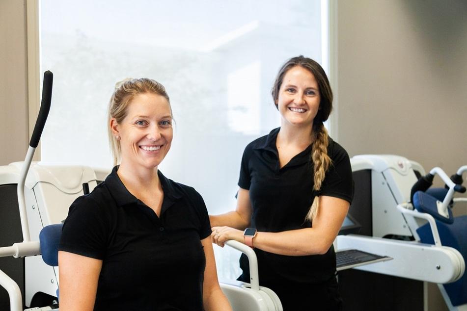 Two physiotherapists in a gym